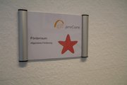 Beschilderung eines Förderraums im Autismus-Zentrum Rostock